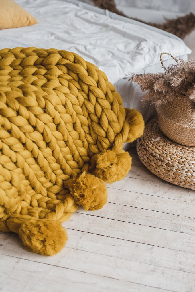 Yellow throw blanket with best sale pom poms